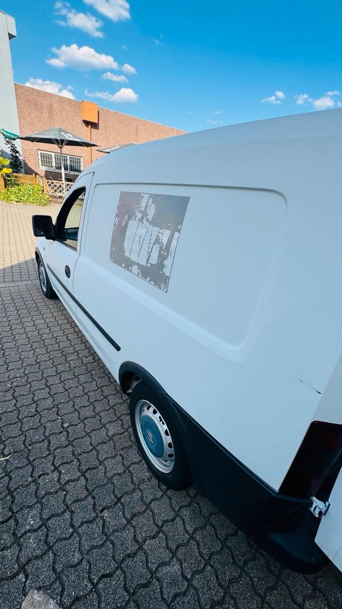 Opel Combo 2005 — engine 75 HP (55kW)
