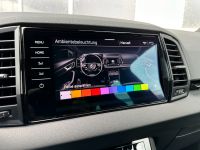 SKODA Karoq 2.0 TSI DSG 4x4 Sportline PANO AHK 5J GAR bei Autohaus Landmann & Maier OHG