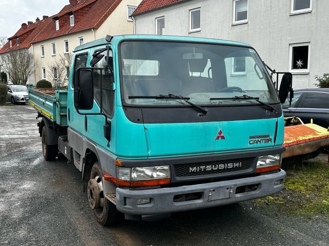 Mitsubishi Canter drei Seiten, Kipper