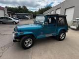 Jeep Wrangler Laredo - Jeep Grand Cherokee mit Benzin-Antrieb: Laredo