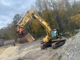 CAT 320D LRR mit 2 Schaufel - CAT Mobilbagger M320