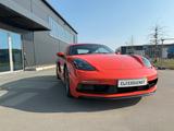 Porsche Cayman Cayman Lavaorange neuwertig - Porsche mit Benzin-Antrieb: Coupé, Orange