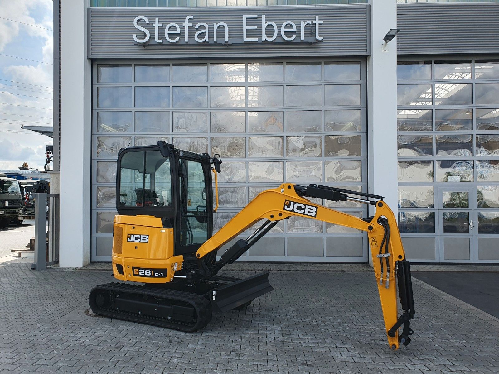 Fahrzeugabbildung JCB 26C-1 Pro Cab / Neufahrzeug / Planierschild