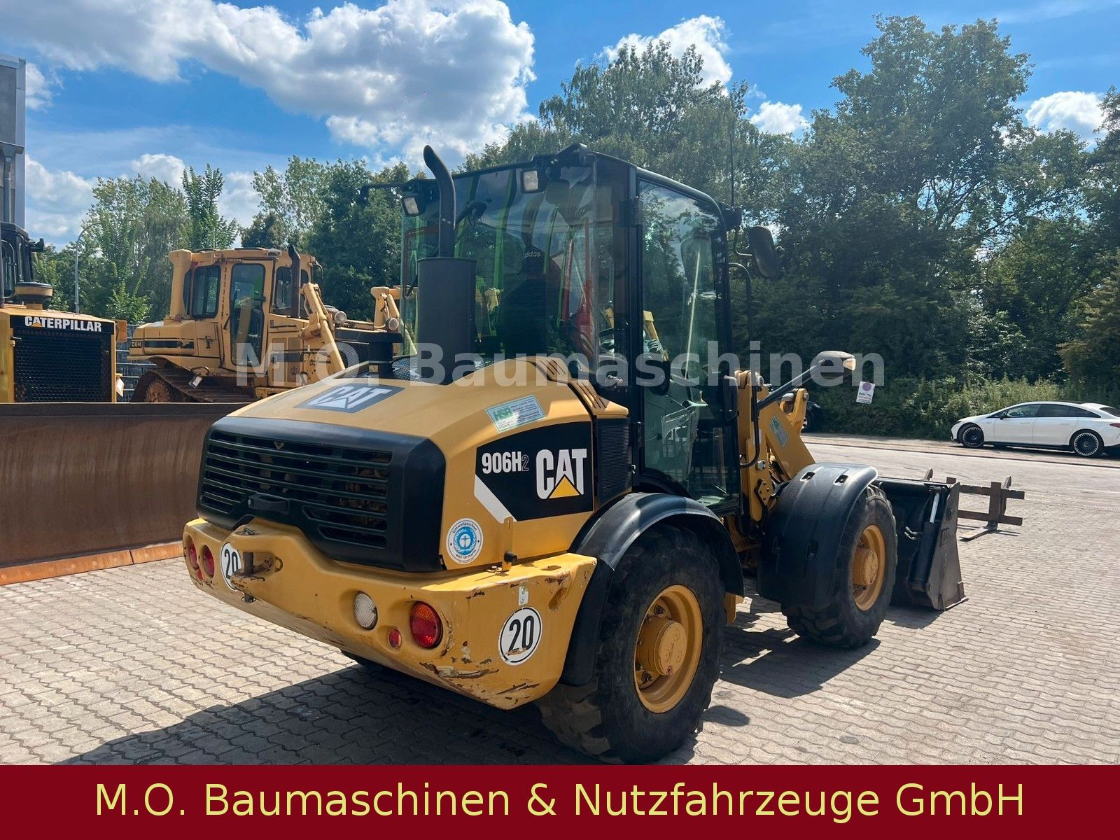 Fahrzeugabbildung CAT 906 H -2 / Klappschauefl / Gabel / SW/
