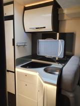 Roller Team 294 TL Teilintegriert Wohnmobil mit Hubbett  - Wohnmobil oder -wagen mit Hubbett