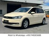 Volkswagen Touran 2.0 TDI SCR DSG Comfortline *Navi/PDC/6+1 - 7 Sitzer Autos