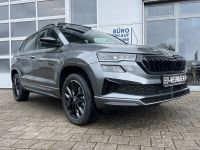 Skoda Karoq 1.5 TSI DSG Sportline PANO KAM AHK 4JGAR bei Autohaus Landmann & Maier OHG
