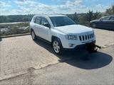 Jeep Compass 2011 - Jeep Grand Cherokee aus 2011
