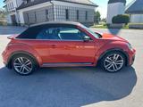 Volkswagen Beetle 2.0 TSI Rline, DSG, SHZ, RFK, Navi  - mit Benzin-Antrieb: Orange, Cabrio