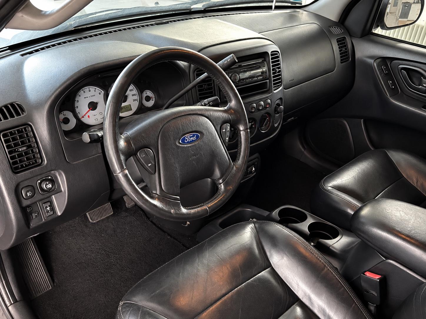 Ford Maverick 2004 — photo 9