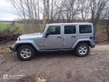 Jeep Wrangler JKU 2,8 CRD Sahara - Jeep Wrangler in Braunschweig