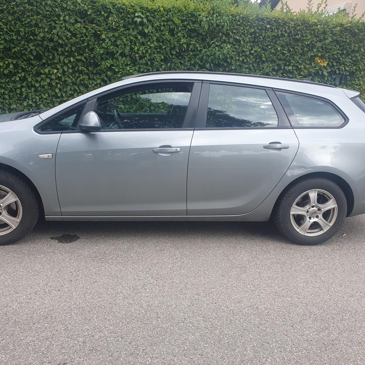 Opel Astra 2014 — photo 8