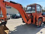 Kramer Allrad Baggerlader 416 S & TB 65 - Bagger