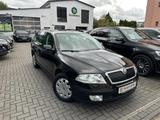 Skoda Octavia Combi 2.0TDI DSG Elegance*PDC*AHK*1.HAND - Skoda Octavia: Combi Elegance TDI