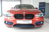 BMW 118 i Sport Line LED Navi Hi-Fi M-Lenkrad - mit Benzin-Antrieb: Orange, Limousine