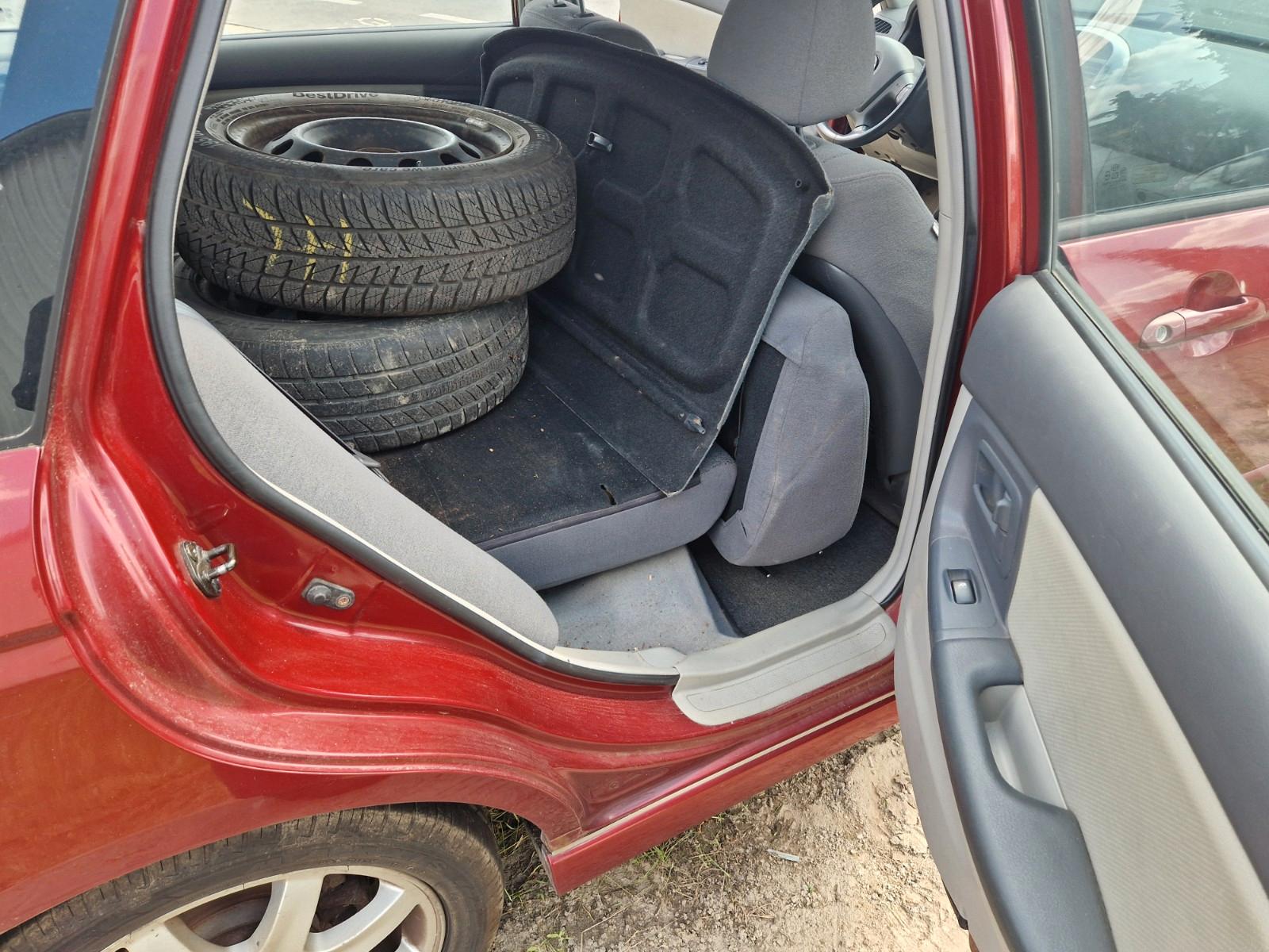 Kia Cerato 2005 — photo 14