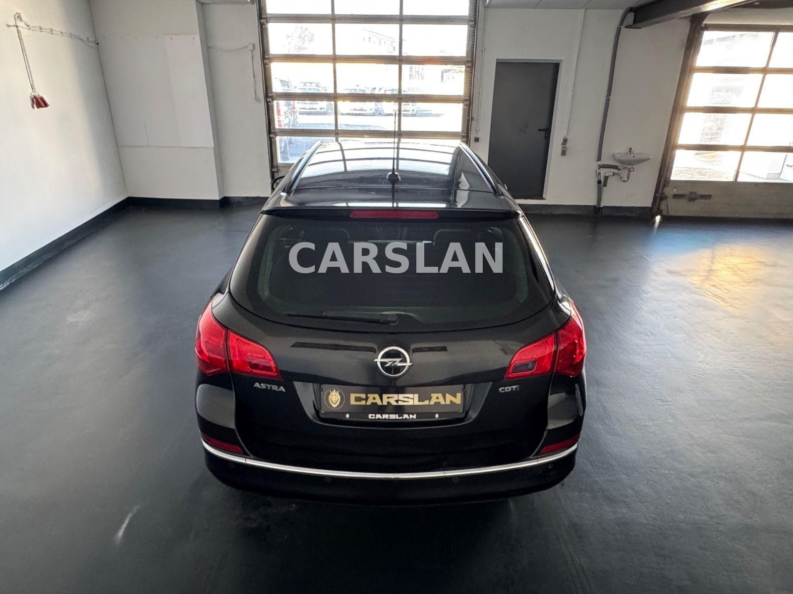Opel Astra 2013 — photo 14