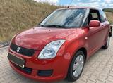 Suzuki Swift 1,3 Club Club - Suzuki Swift: Orange