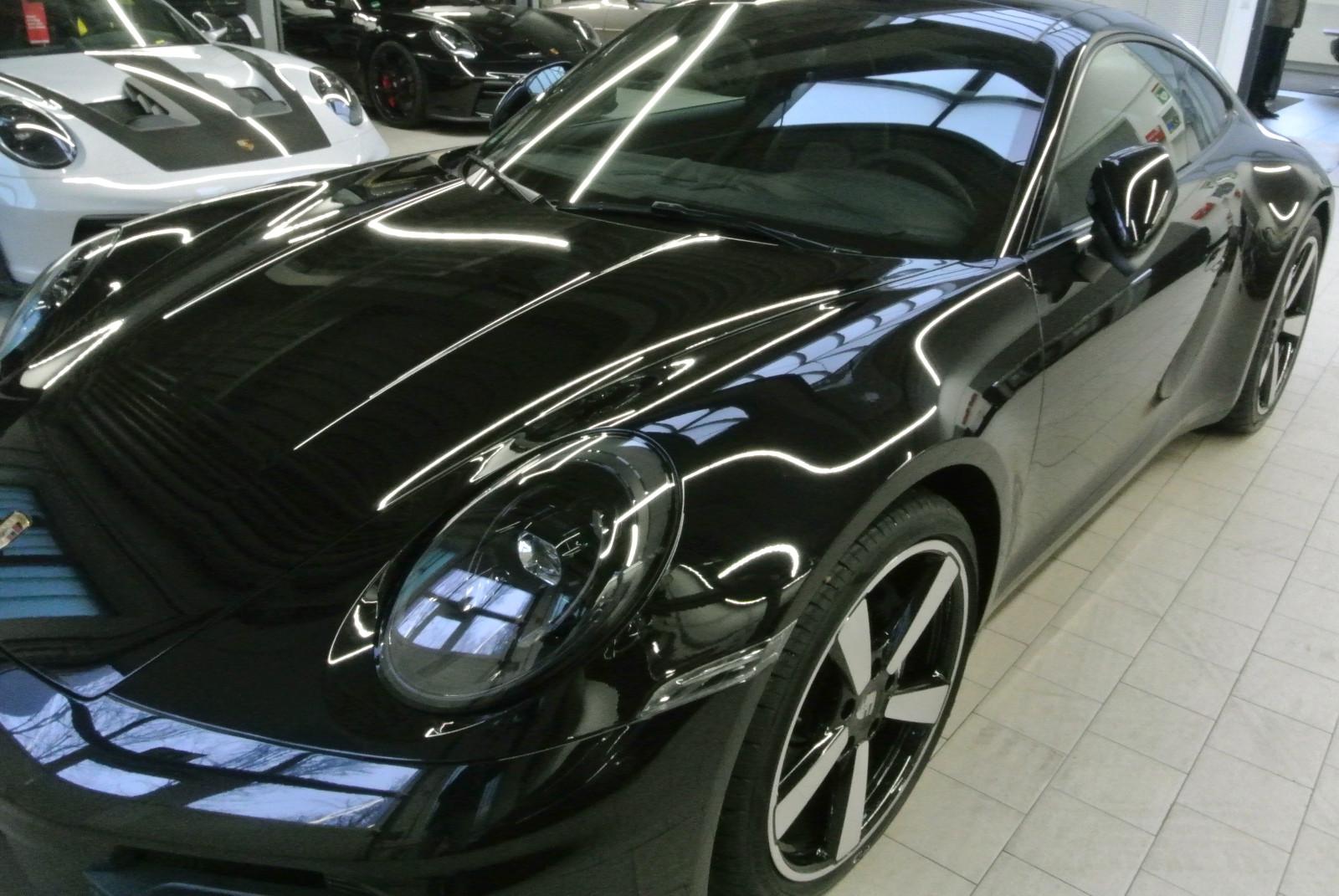 Porsche 992.2 coupe, mod 2025, schw/schw,abgas,bose,21",
