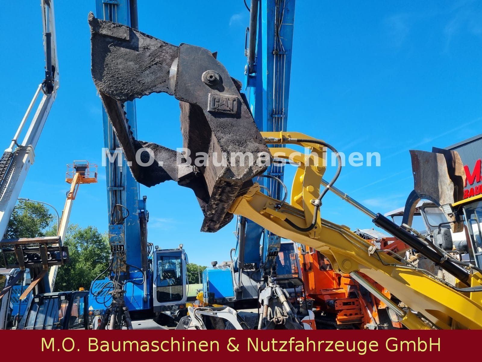 Fahrzeugabbildung CAT 906  / Klappschaufel /  SW /