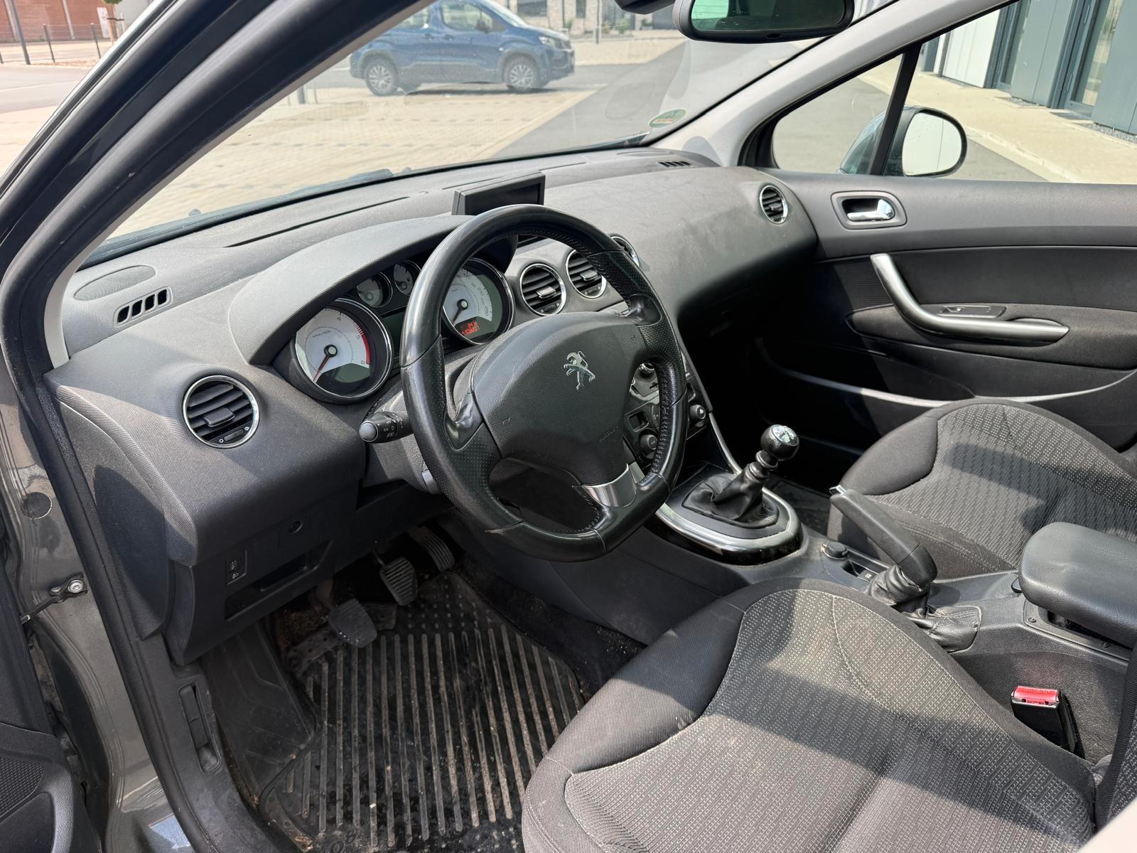 Peugeot 308 2013 — photo 8