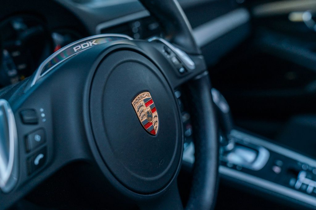 PORSCHE 991 Carrera 4 Cabriolet/ PASM / SPORT AGA / BOSE PORSCHE 991 Carrera 4 Cabriolet/ PASM / SPORT AGA / BOSE