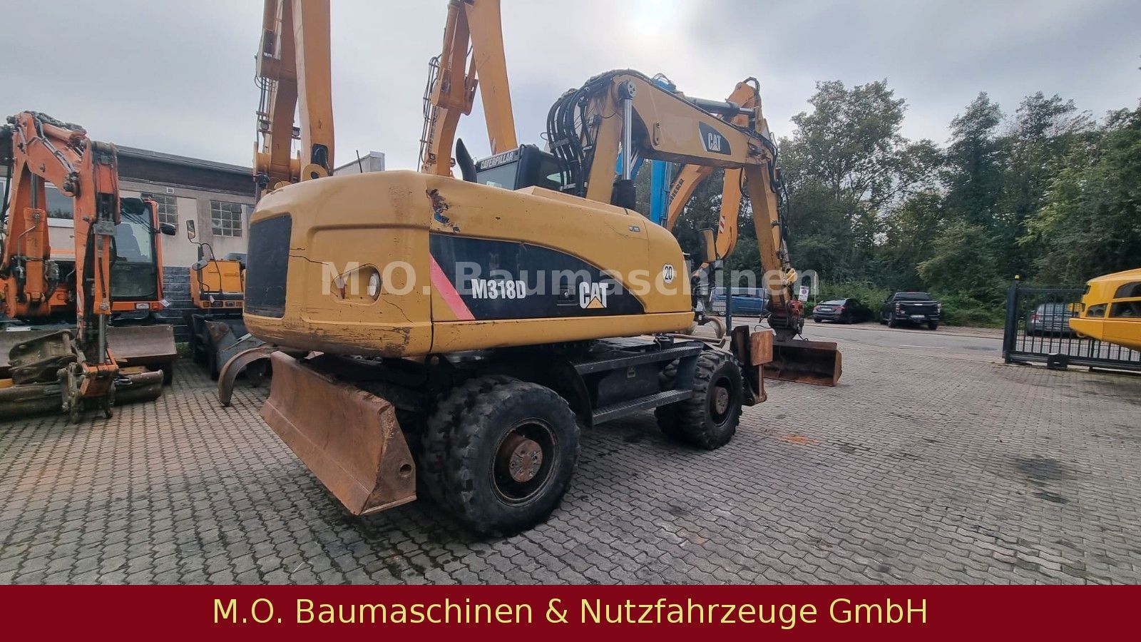 Fahrzeugabbildung CAT M 318 D  / SW /Hammerline / VSA / AC /