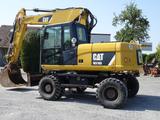 CAT M316 D mit OQ 70/55 - CAT Raupe/Dozer D5