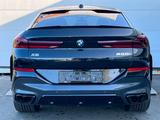 BMW X6 M60i xDrive/22"/M-SPORT/INNO+TRAVEL-P./GESTIK - BMW X6 M60 aus 2023