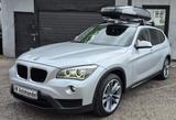 BMW X1 18 i sDrive Navi Kamera Bi Xenon Dachbox - BMW X1 aus 2012 mit Benzin-Antrieb: Geländewagen