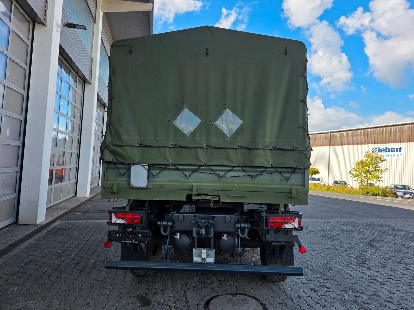 Fahrzeugabbildung Mercedes-Benz Atego 1018 A 4x4 Pritsche Plane