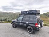 Mitsubishi Mitsubischi Pajero 4x4 mit Dachzelt und Au... - gebrauchte Mitsubishi Pajero aus dem Jahr 2004