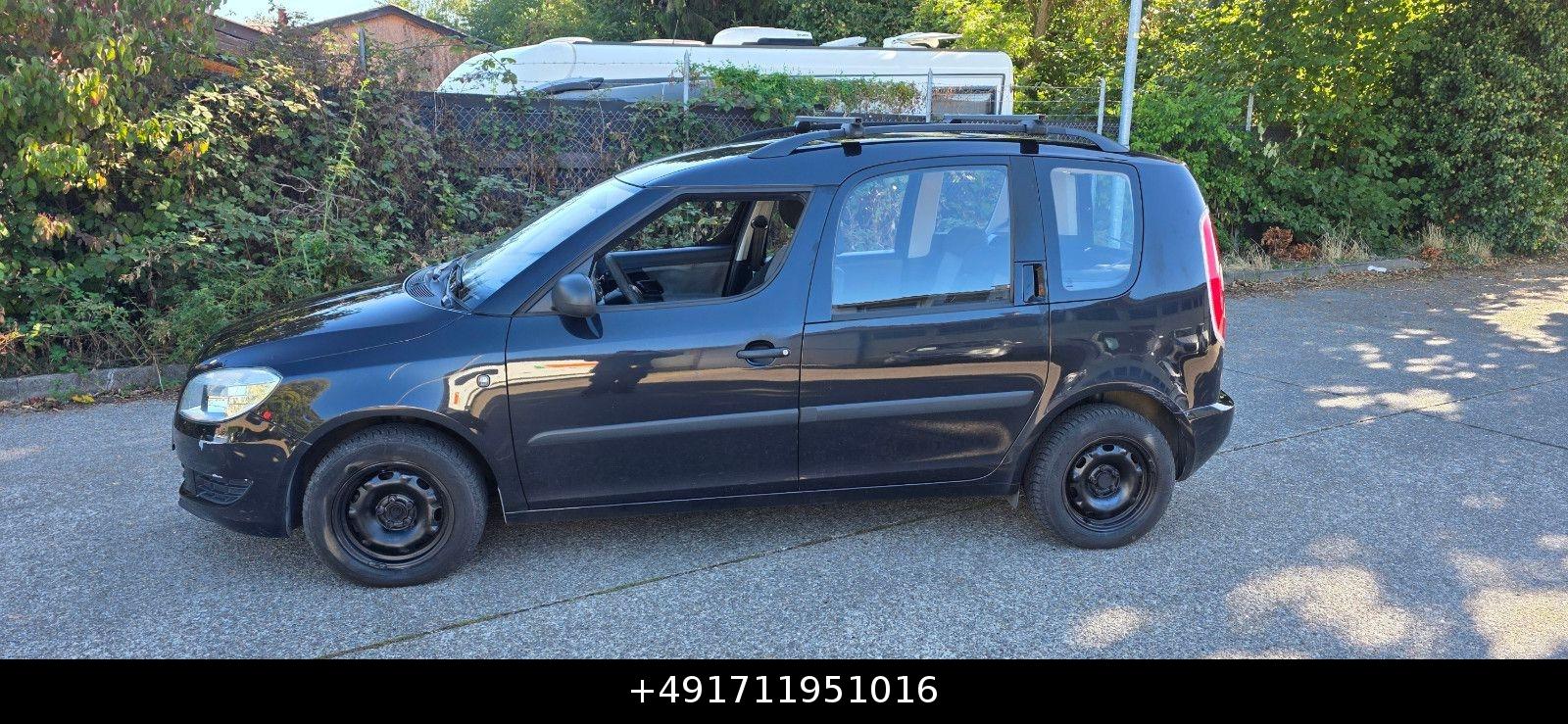 Skoda Roomster 2011 — вигляд ззаду