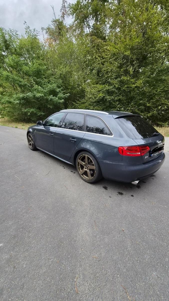 Audi A4 2009 — photo 8