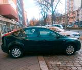 Ford Focus Ghia 1.Hand,shg.klimaaut.,Navi,... - Ford Focus aus 2006: Ghia