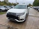 Mitsubishi Outlander PHEV Basis 4WD . Tüv. 07.2027 - Mitsubishi Outlander Basis mit Hybrid-Antrieb (Benzin/Elektro)