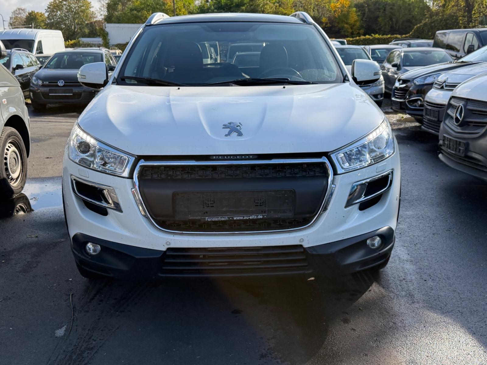 Peugeot 4008 2015 — вигляд ззаду