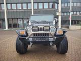 Jeep Wrangler 4.0 Sport HÖHER-BREITER-SUPER OPTIK-AHK - Jeep Wrangler Gebrauchtwagen