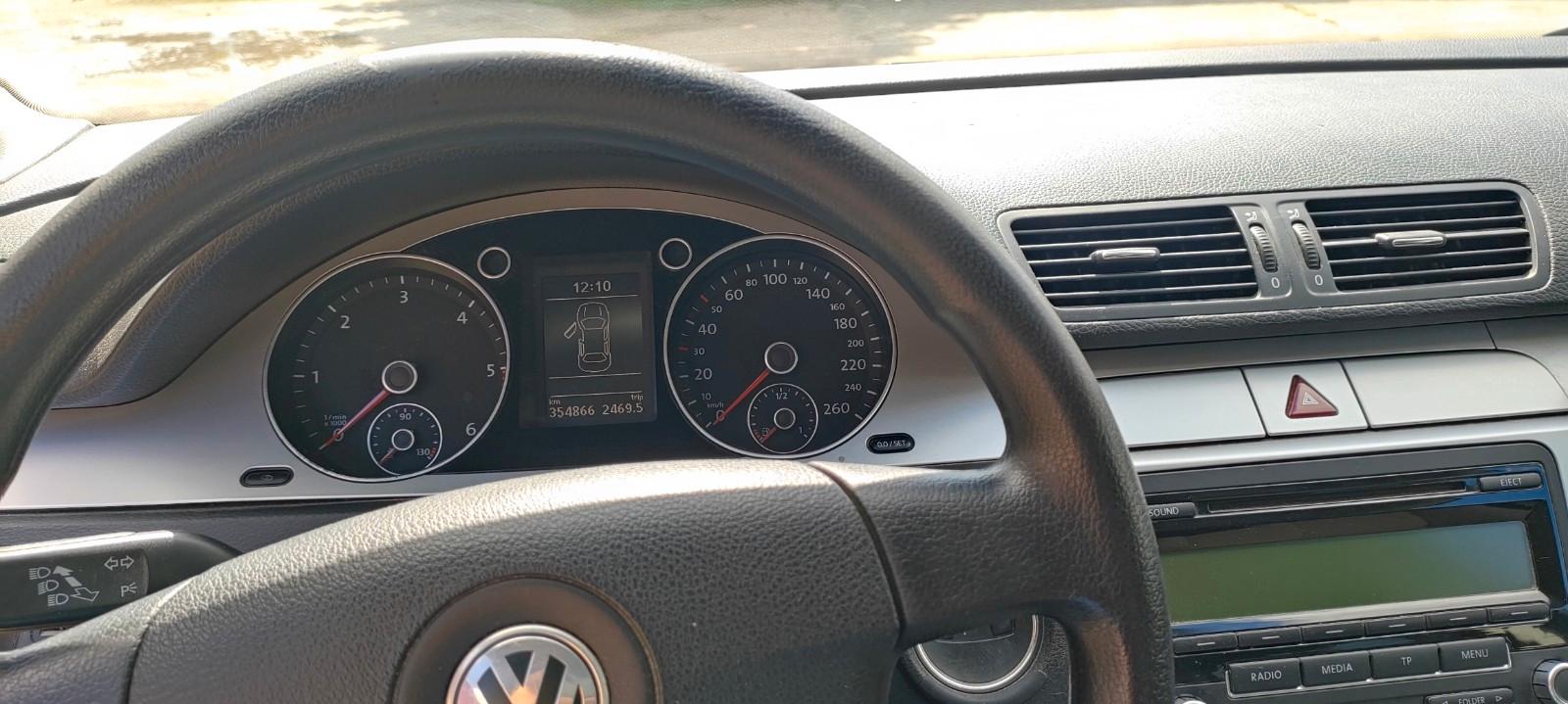 Volkswagen Passat 2009 — photo 8