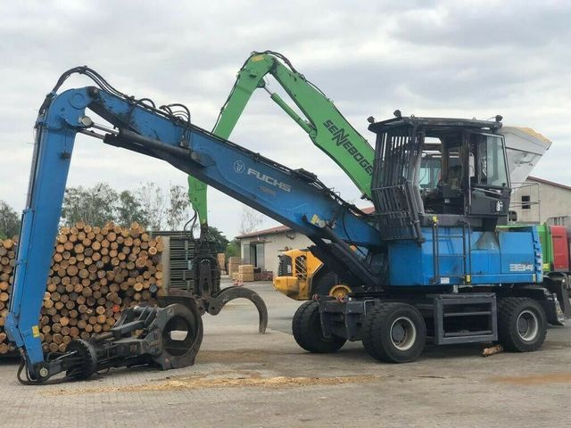 Fuchs MHL334 E Holzumschlagbagger Holzgreifer