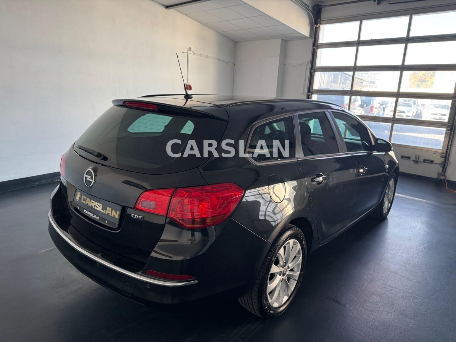 Opel Astra 2013 — photo 12
