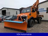 Mercedes-Benz Unimog 427/10 Bagger Schiebeschild Streuaufsatz - Baggerlader Bagger