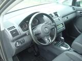 Volkswagen Touran 1.4 TSI DSG Conceptline Conceptline - Volkswagen Touran Conceptline mit Benzin-Antrieb