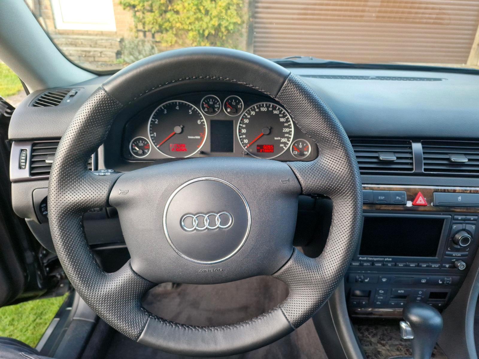 Audi A6 2004 — photo 12