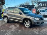 Volkswagen Tiguan Sport & Style 4Motion*Pano*Navi*Xenon*AHK - Volkswagen Tiguan aus 2012 mit Diesel-Antrieb