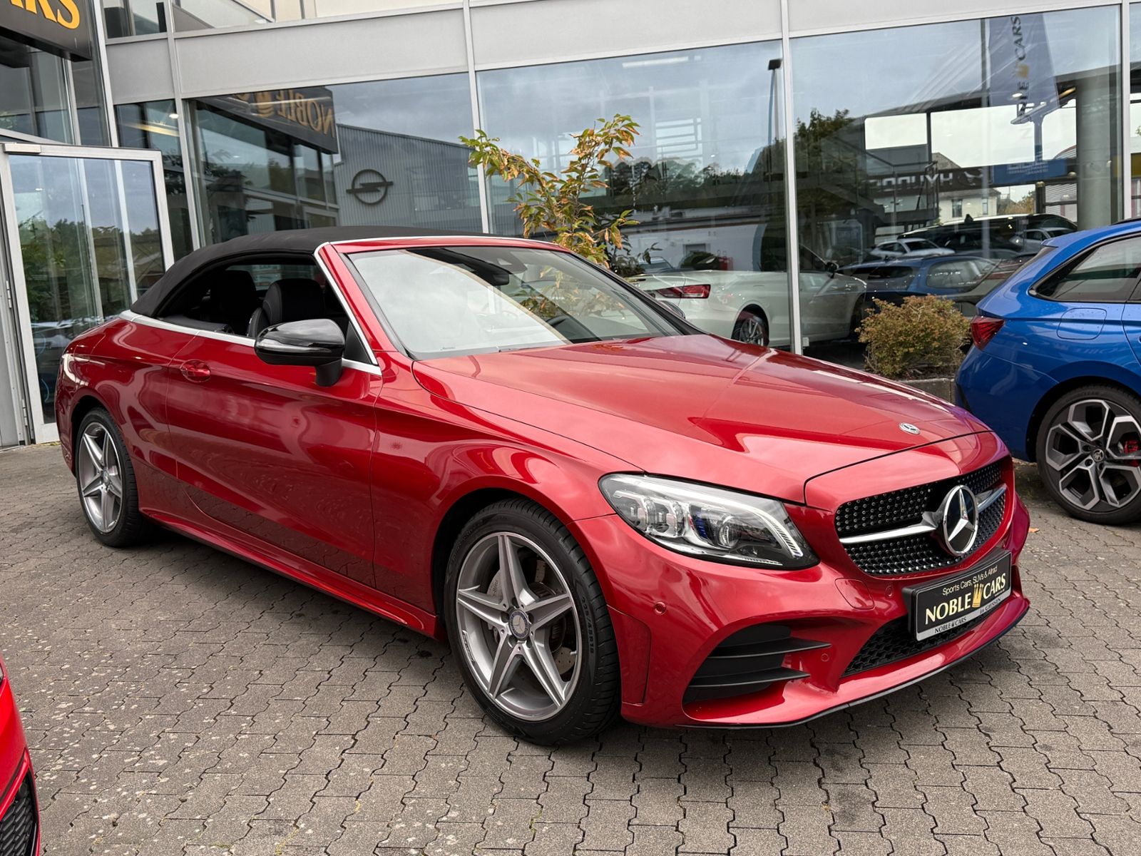 Fahrzeugabbildung Mercedes-Benz C 200 Cabrio AMG NIGHT Navi Rückfahr KAM Sounds.