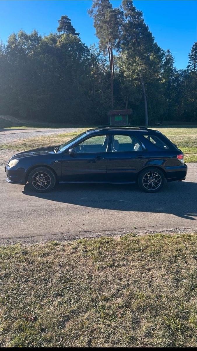 Subaru Impreza 2006 — вигляд ззаду