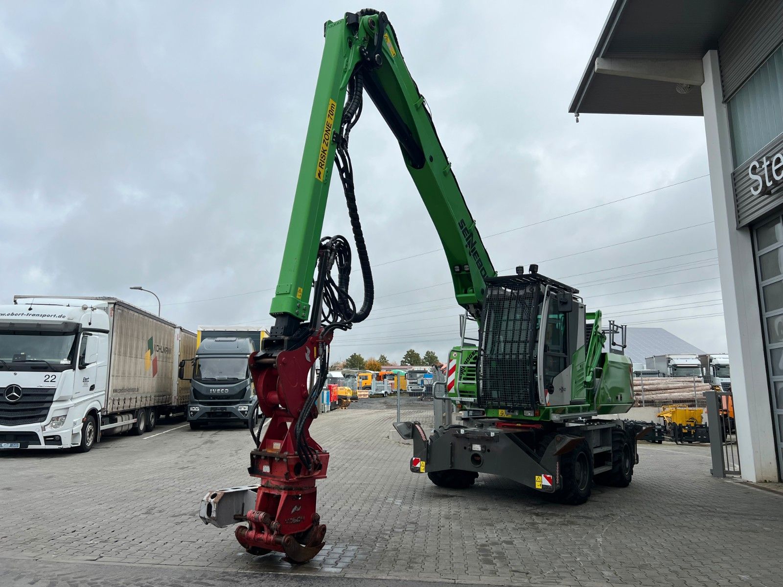 Fahrzeugabbildung Sennebogen 718 / inkl. Vosch Fällzange / nur 1.965h!