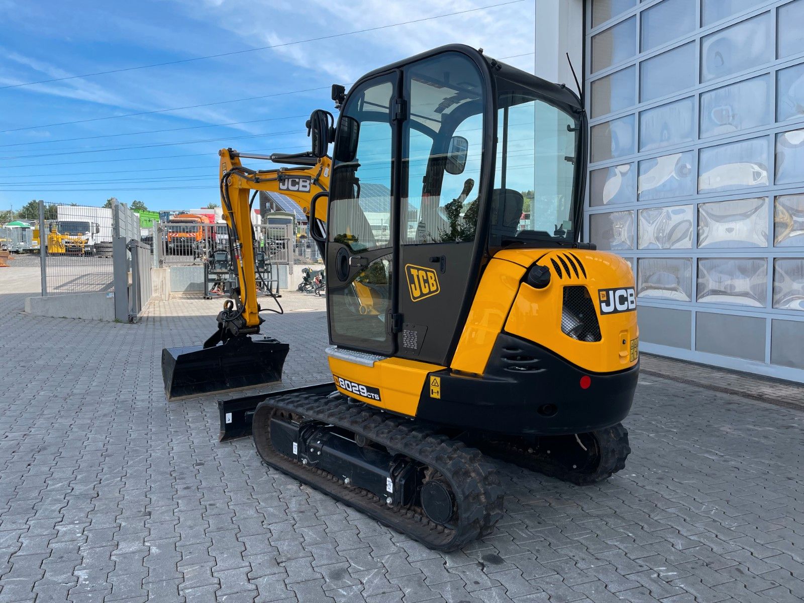 Fahrzeugabbildung JCB 8029 CT / 151h / 2023 / Inkl. Löffelpaket - mit KI generiert/bearbeitet