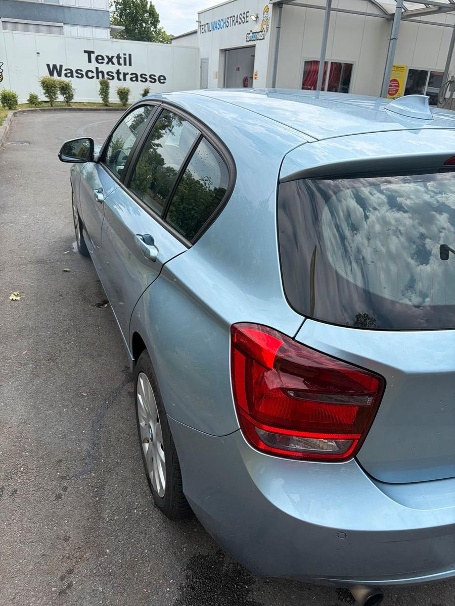 BMW 116 2011 — rear view